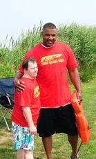 An athlete and his volunteer